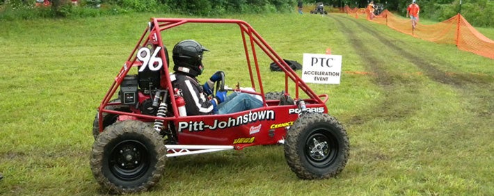 person in a go-kart
